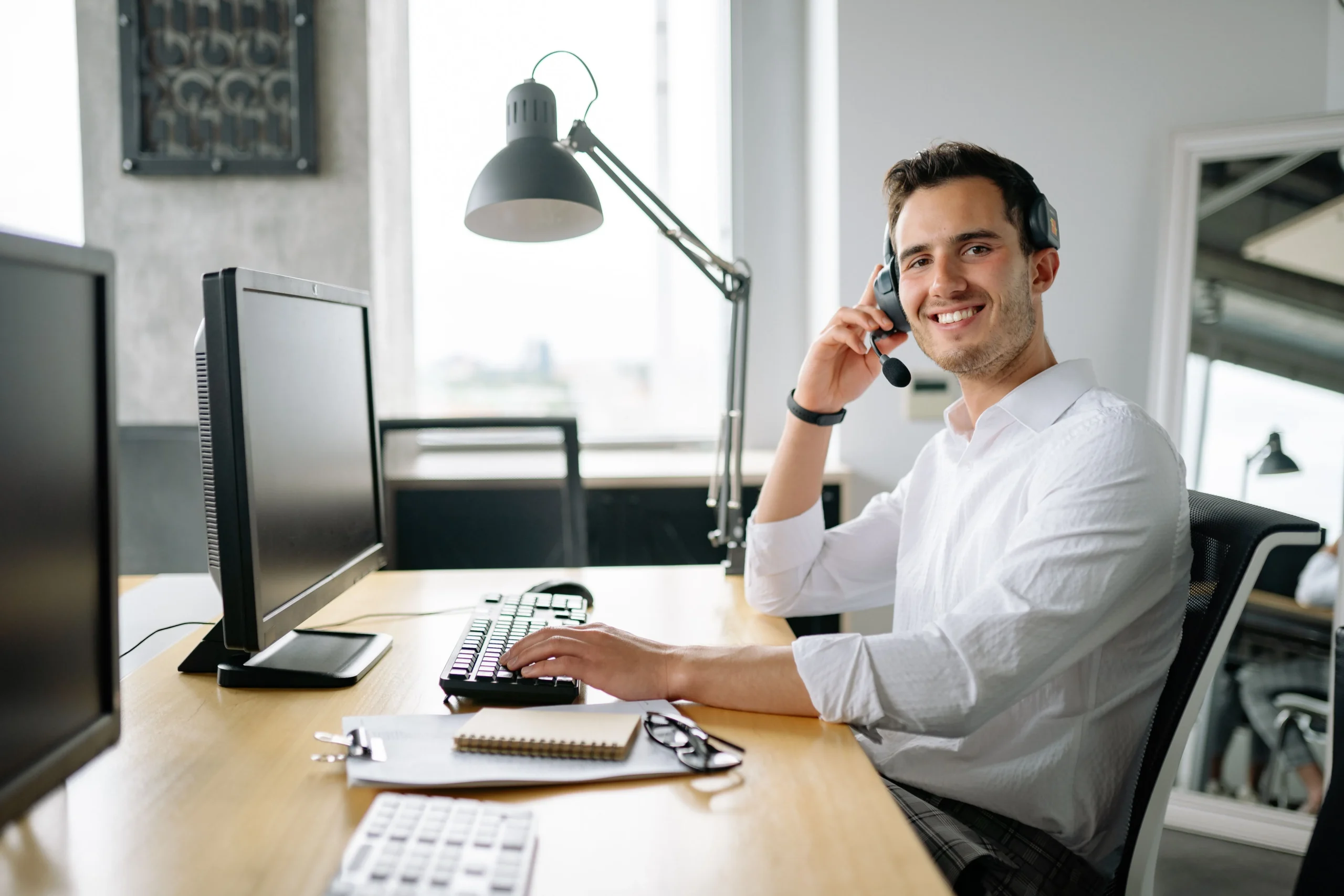 A person sitting in his office.