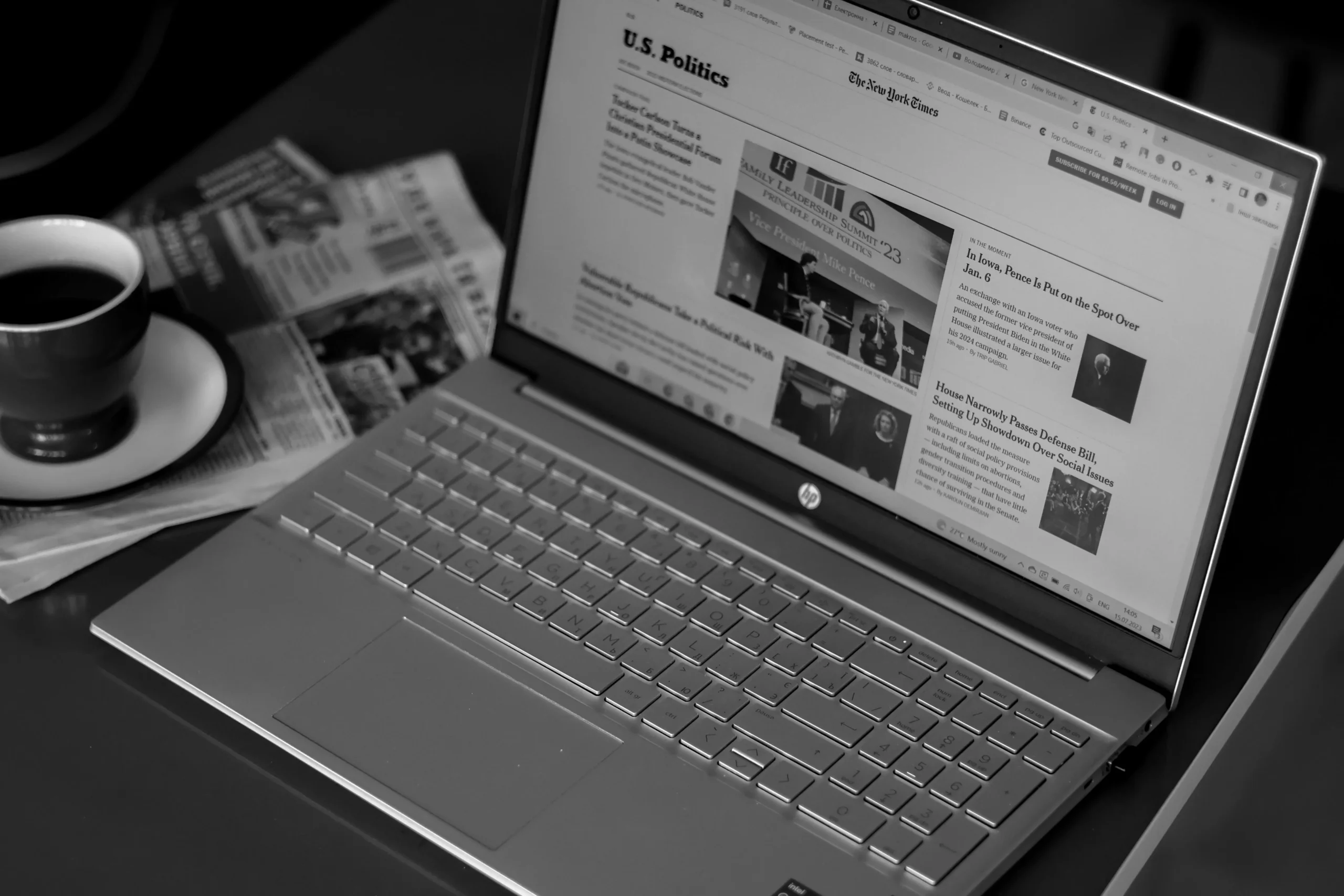 A news site is opened on the laptop.
