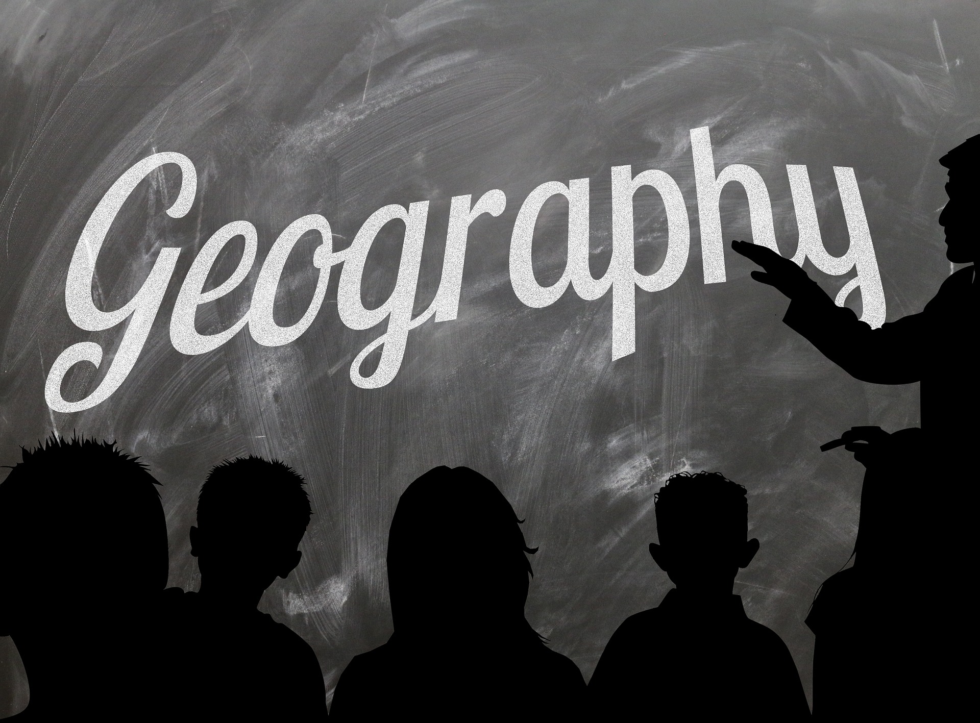 The geography is written on the black board.