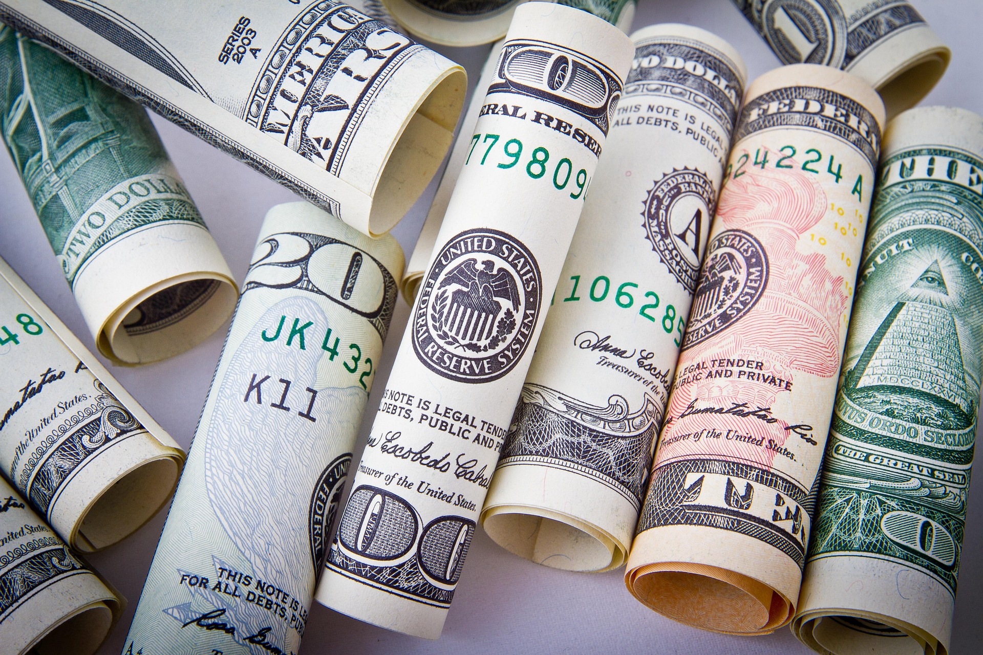 The folded currency is placed on the table.