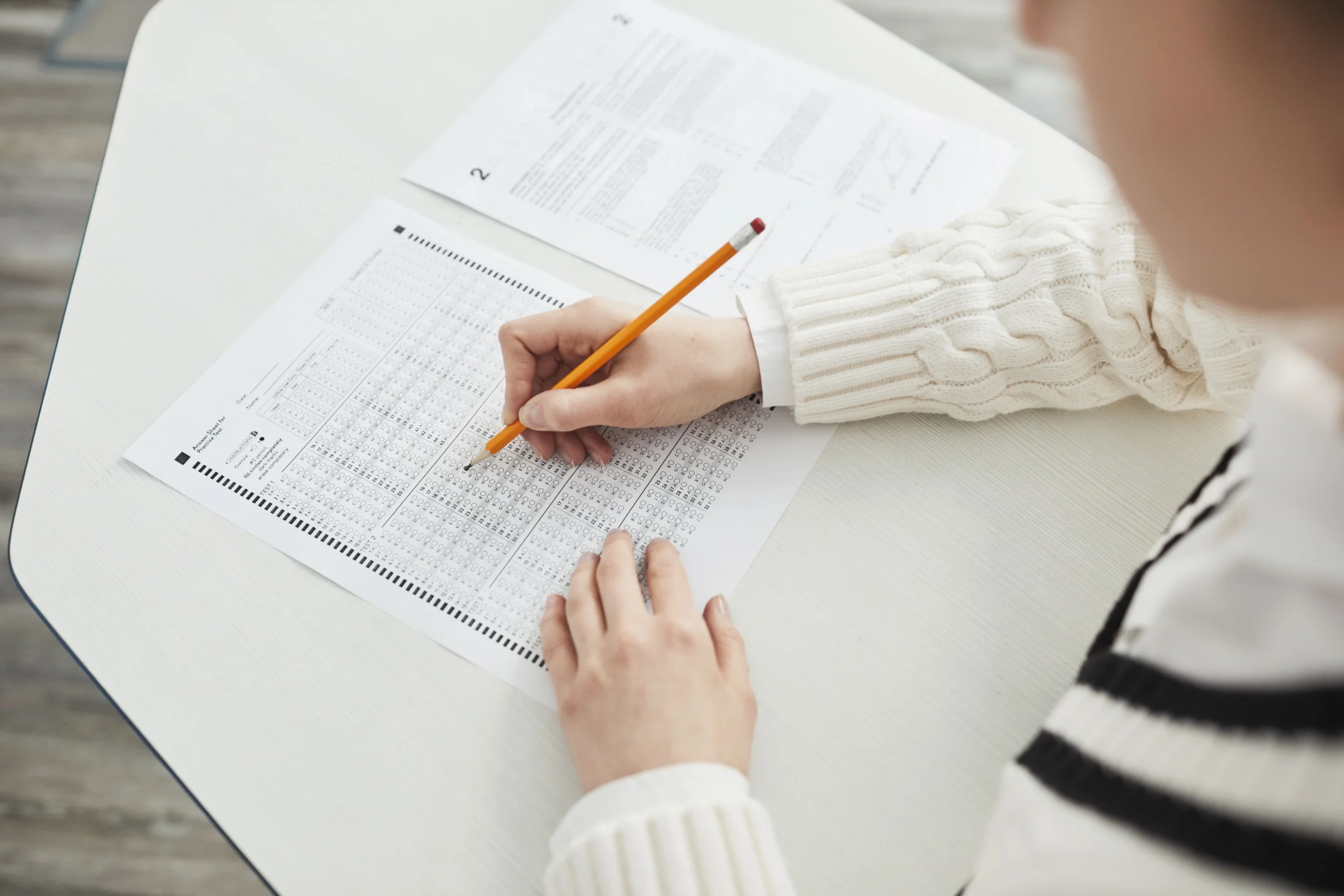 A women is attempting an exam.