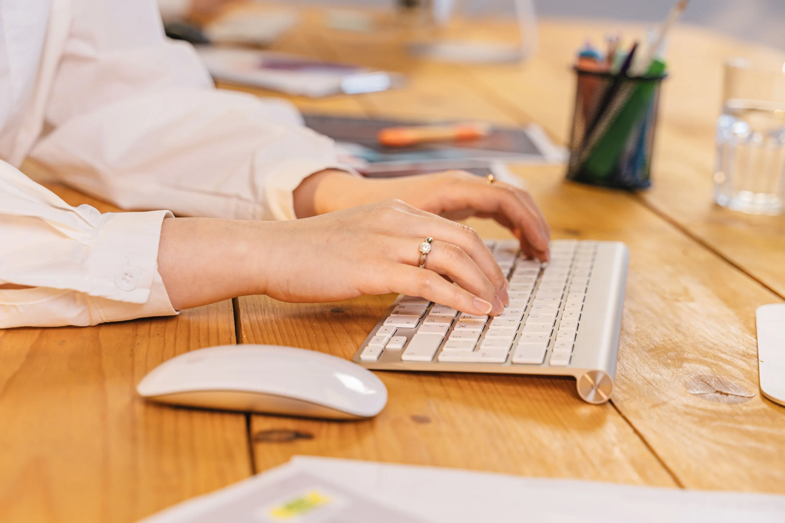A girl is entering data through keyboard.