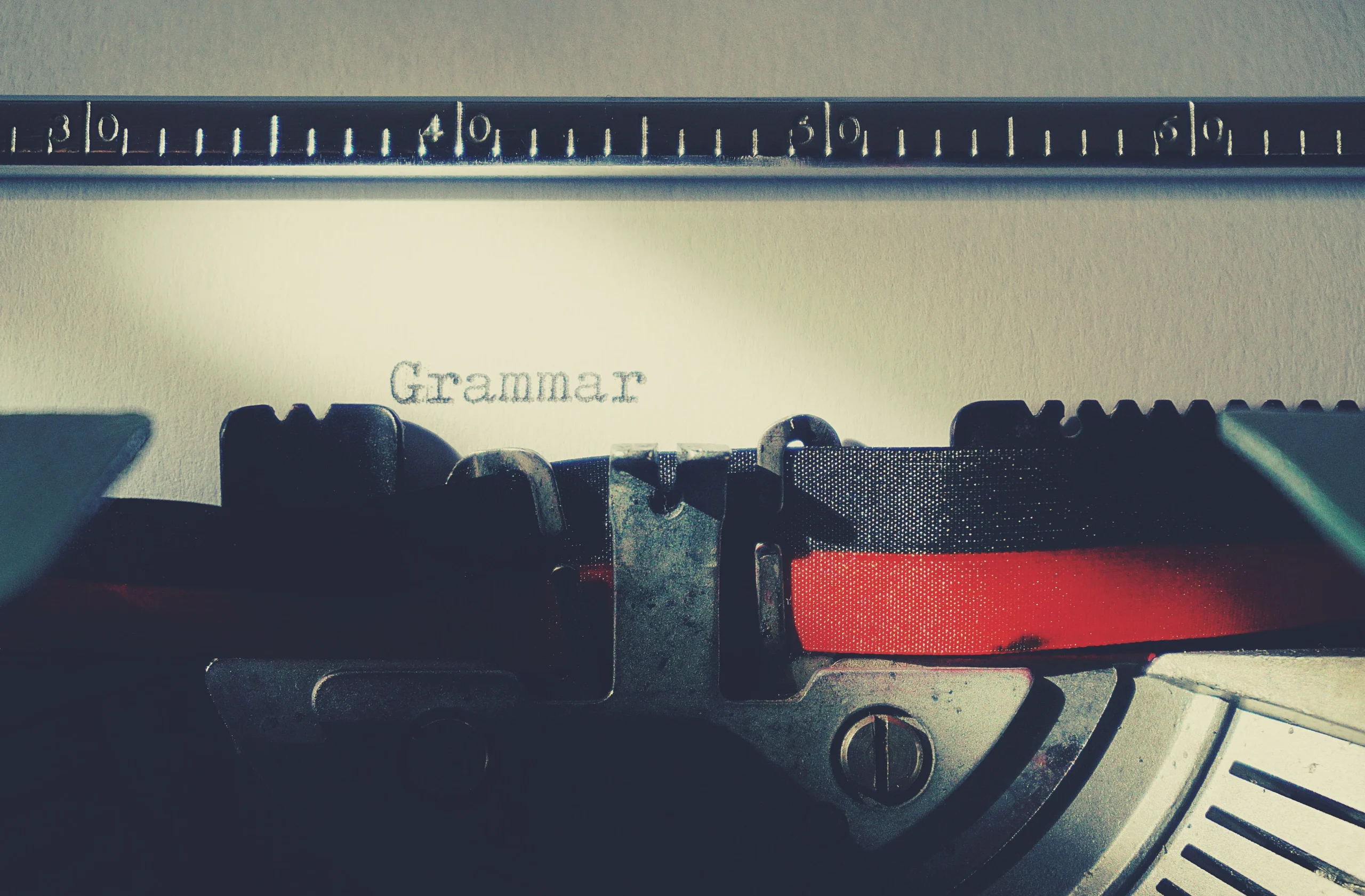 The word grammar is written on the white board.