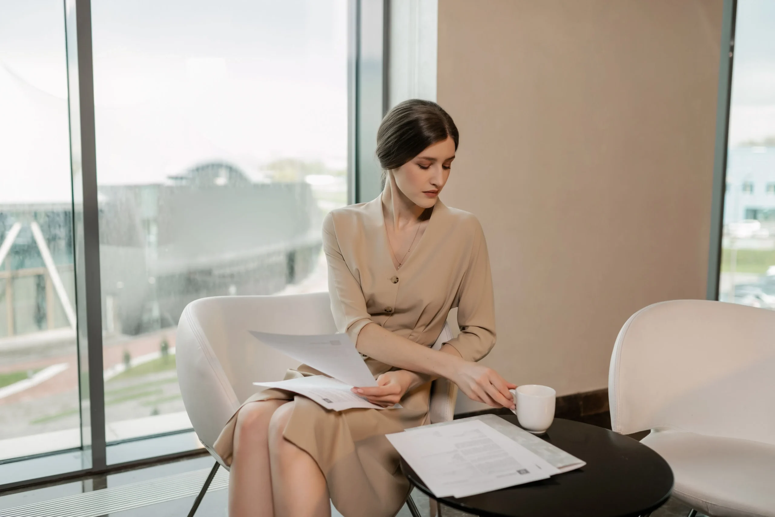 A girl is doing office work.