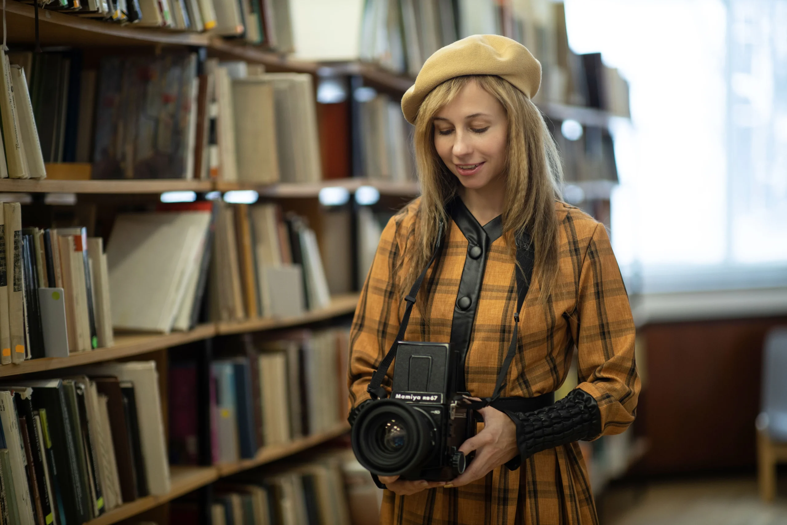 A girl is in the library.