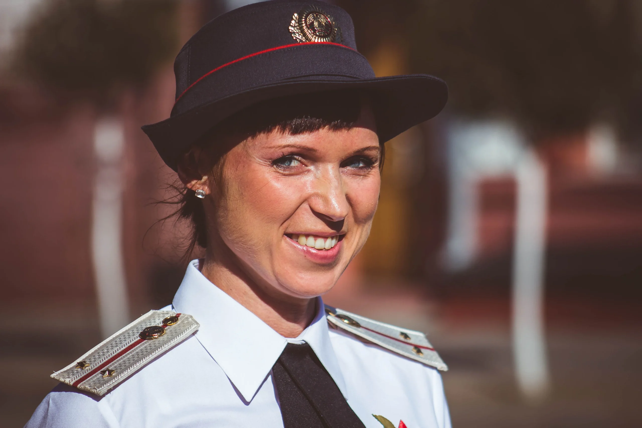 An officer is smiling
