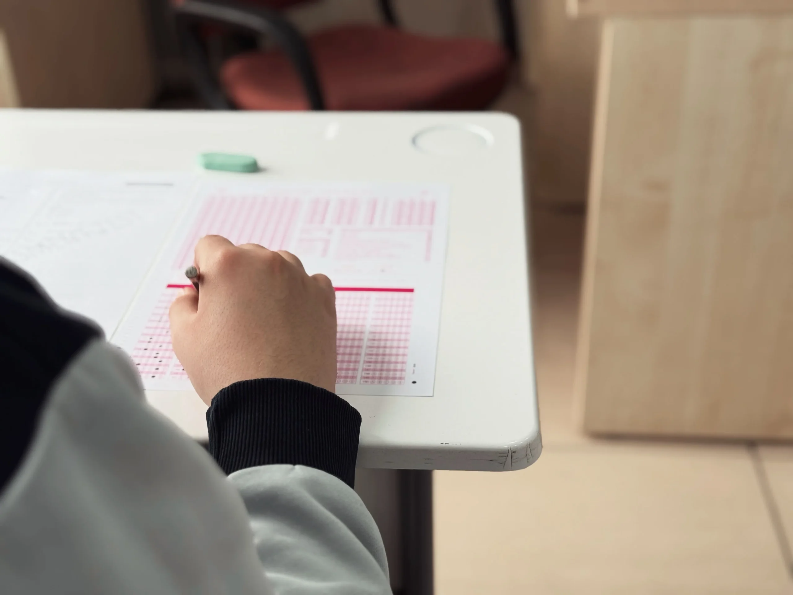 A student is ticking the correct options.
