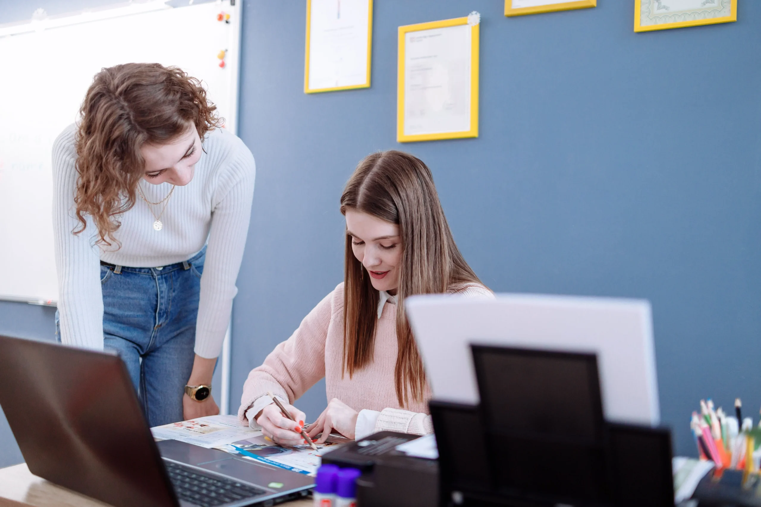 A women teaching her student.